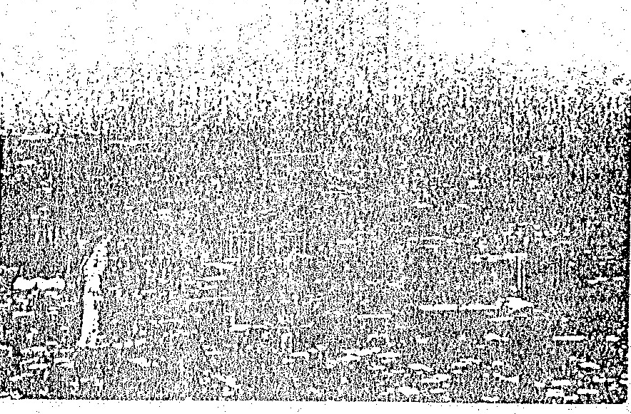 A grainy grayscale photograph of a hazy mountain landscape with a prominent atmospheric light effect, illustrating the 'aura' or 'light anomaly' phenomenon discussed in the text.